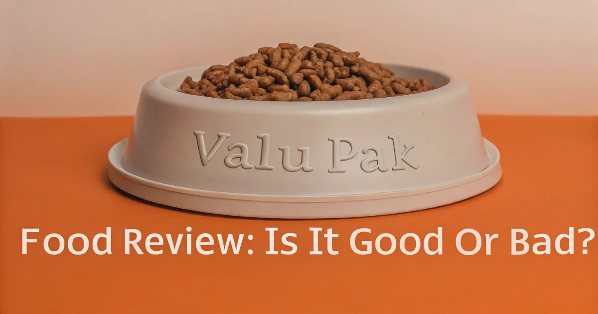 A bowl of Valu Pak dry dog food on an orange surface.